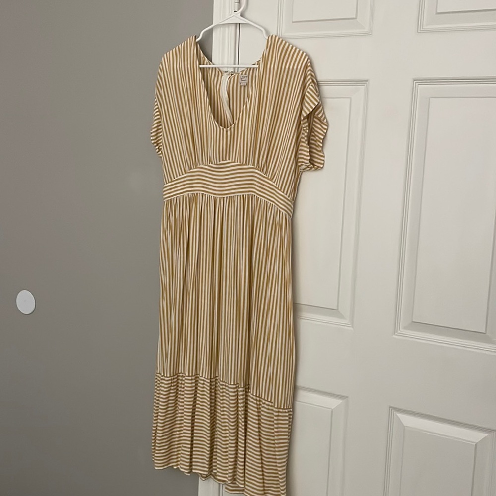 Maxi dress by Loft.  Gold and White striped dress.  Never worn.